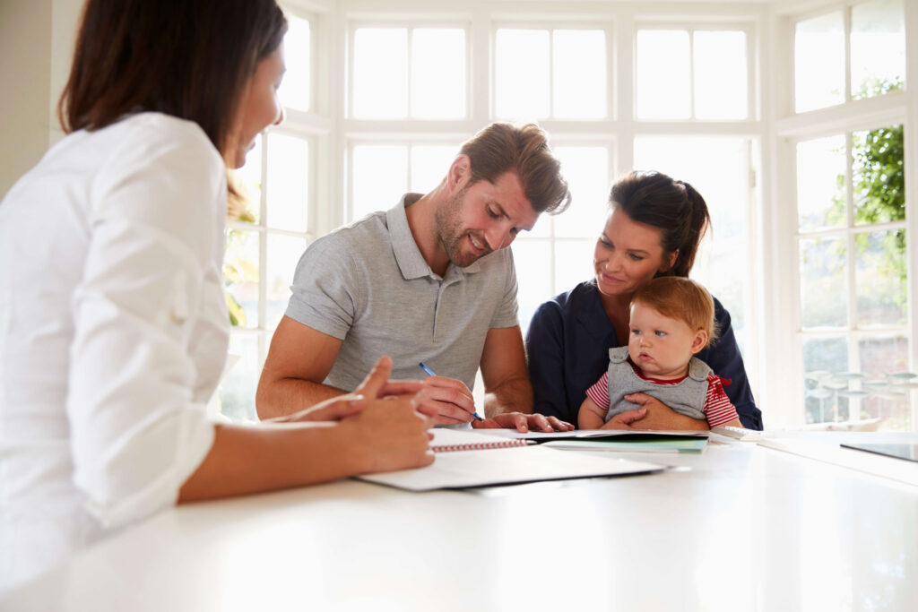 Happy Family Real Estate Signing